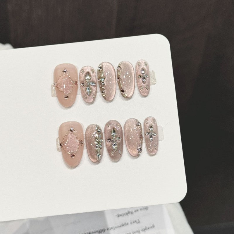 Ditto diamond-encrusted medium oval press-on nails reusable design