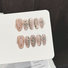 Ditto diamond-encrusted medium oval press-on nails reusable design