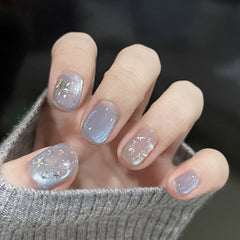 Short oval waterproof vegan reusable sweet-and-edgy blue starry press-on nails Ditto