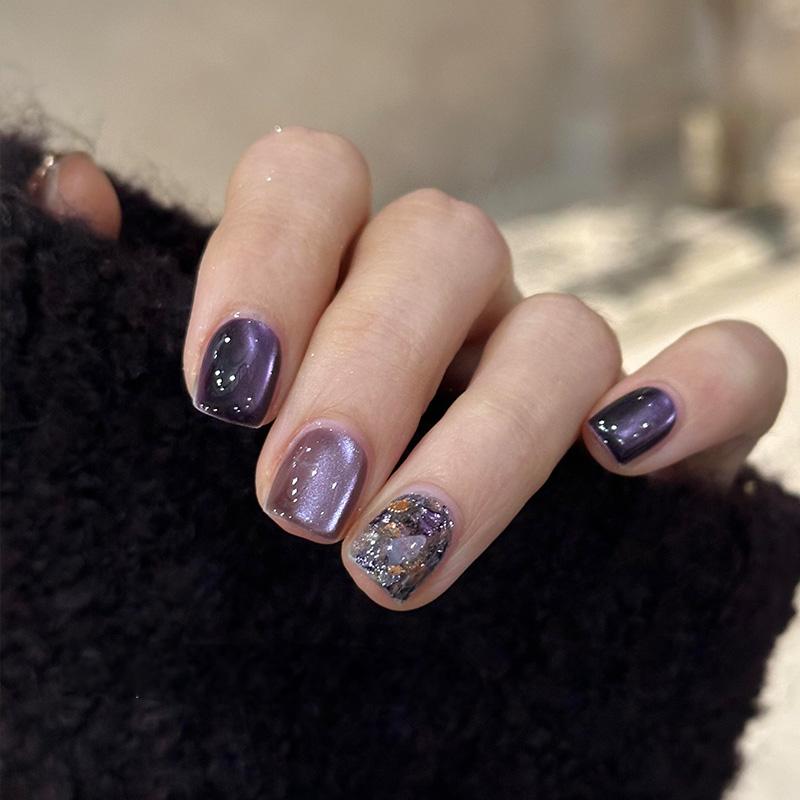 Ditto nocturne violet press-on nails worn on hands short square shape
